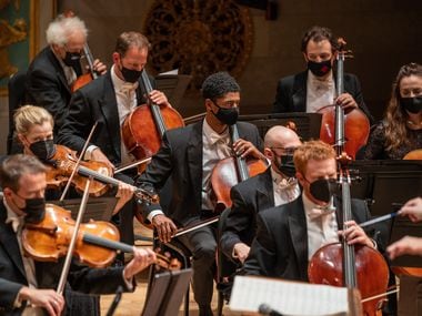 Cole Randolph (center) performed in the cello section of the Detroit Symphony Orchestra for...