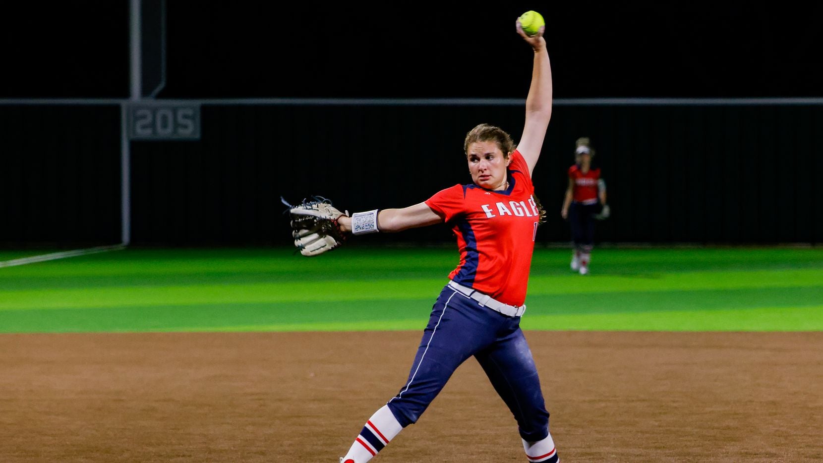 Allen's Alexis Telford (10) pitches during the seventh inning of a District 5-6A game...