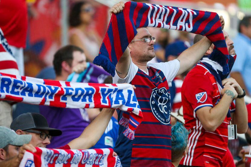 Fans cheer before an MLS game between FC Dallas and FC Cincinnati on Saturday, August 31,...