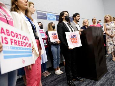 Democratic nominee for Texas Congressional District 35 Greg Casar (at podium) joined other...