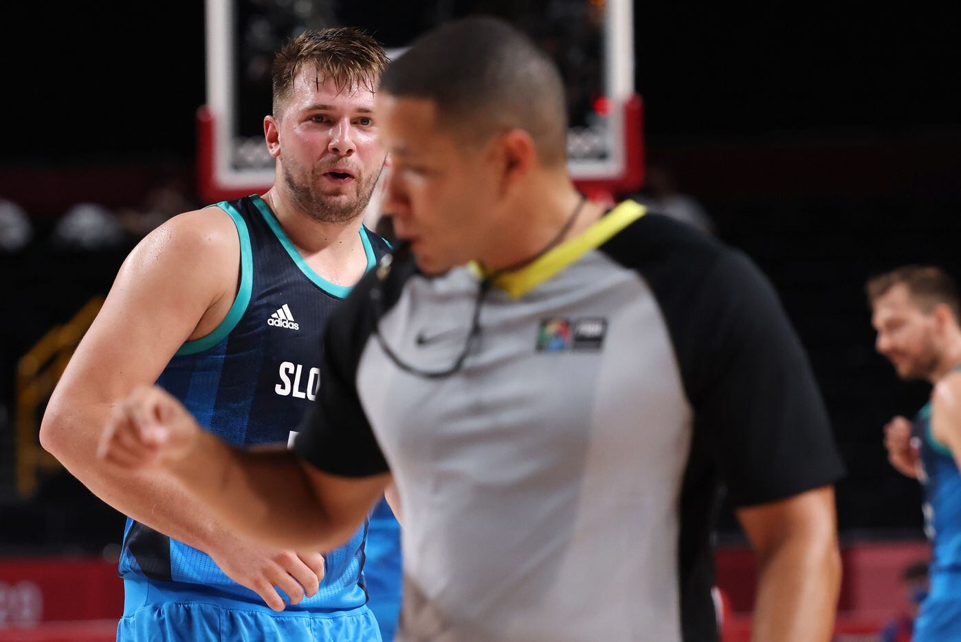 Slovenia’s Luka Doncic (77) reacts to a referee’s call signaling the ball was out on Slovenia after a play in the second half of play against Argentina during the postponed 2020 Tokyo Olympics at Saitama Super Arena on Monday, July 26, 2021, in Saitama, Japan. Slovenia defeated Argentina 118-100. (Vernon Bryant/The Dallas Morning News)