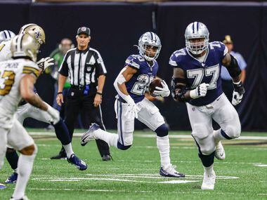 Dallas Cowboys running back Tony Pollard (20) runs with the football during the second half at the Caesars Superdome in New Orleans, Louisiana December 2, 2021.
