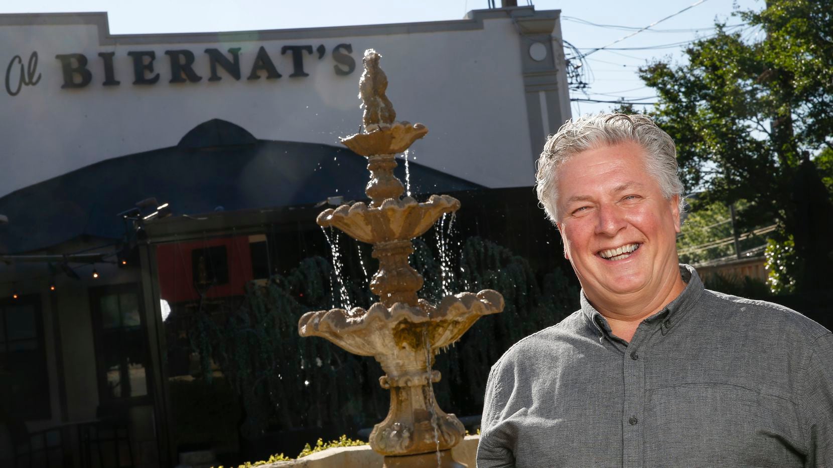 Al Biernat poses for a photograph outside the Highland Park location of his steakhouse, Al...