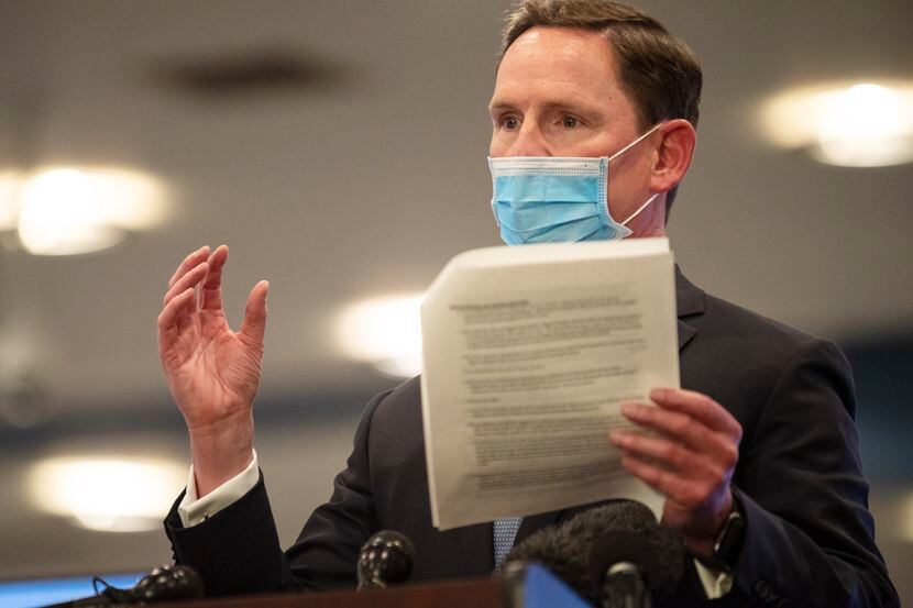 Dallas County Judge Clay Jenkins conducts a press conference about COVID-19 vaccine...