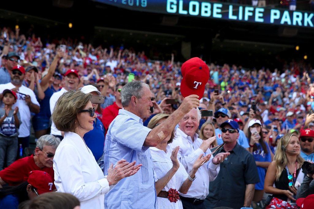 Former President George W. Bush and former First Lady Laura Bush are recognized in the 5th...