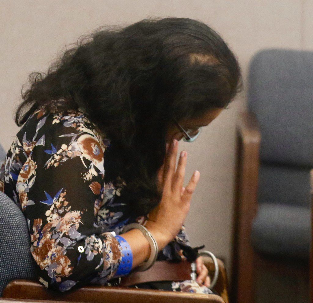 Sini Mathews, mother of Sherin Mathews, waits for her and her husband's hearing to resume in Judge Cheryl Lee Shannon's courtroom on Wednesday.