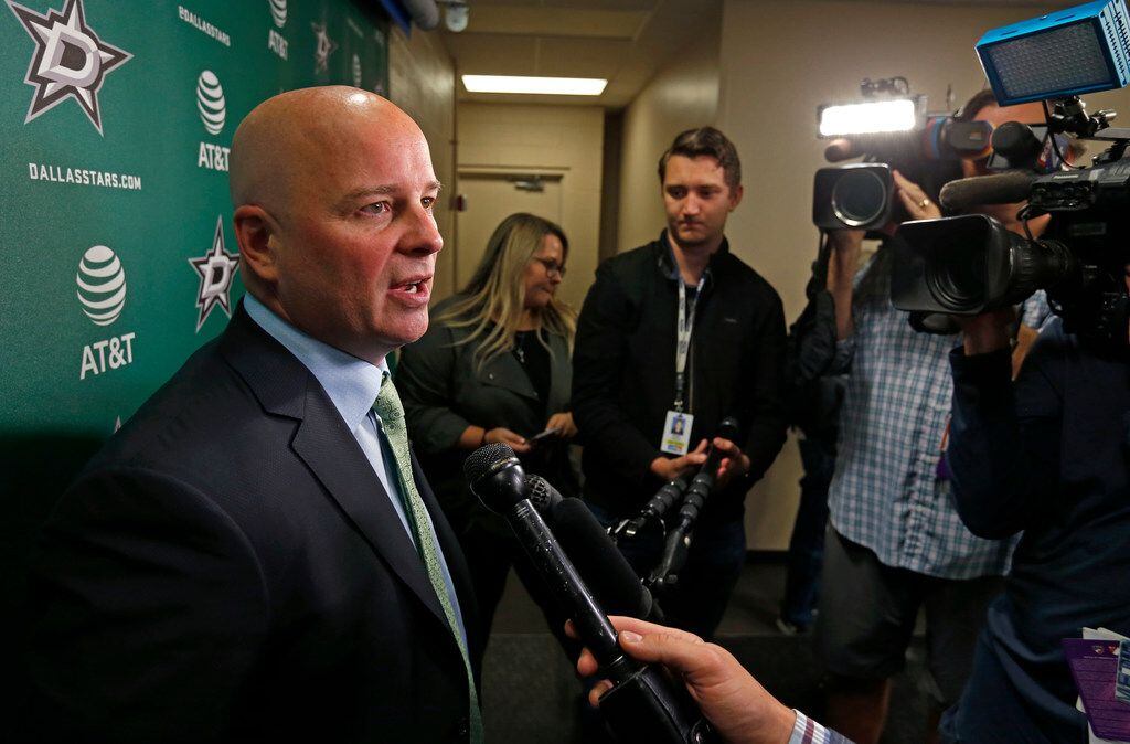 New Dallas Stars head coach Jim Montgomery talks with the media after a press conference at...