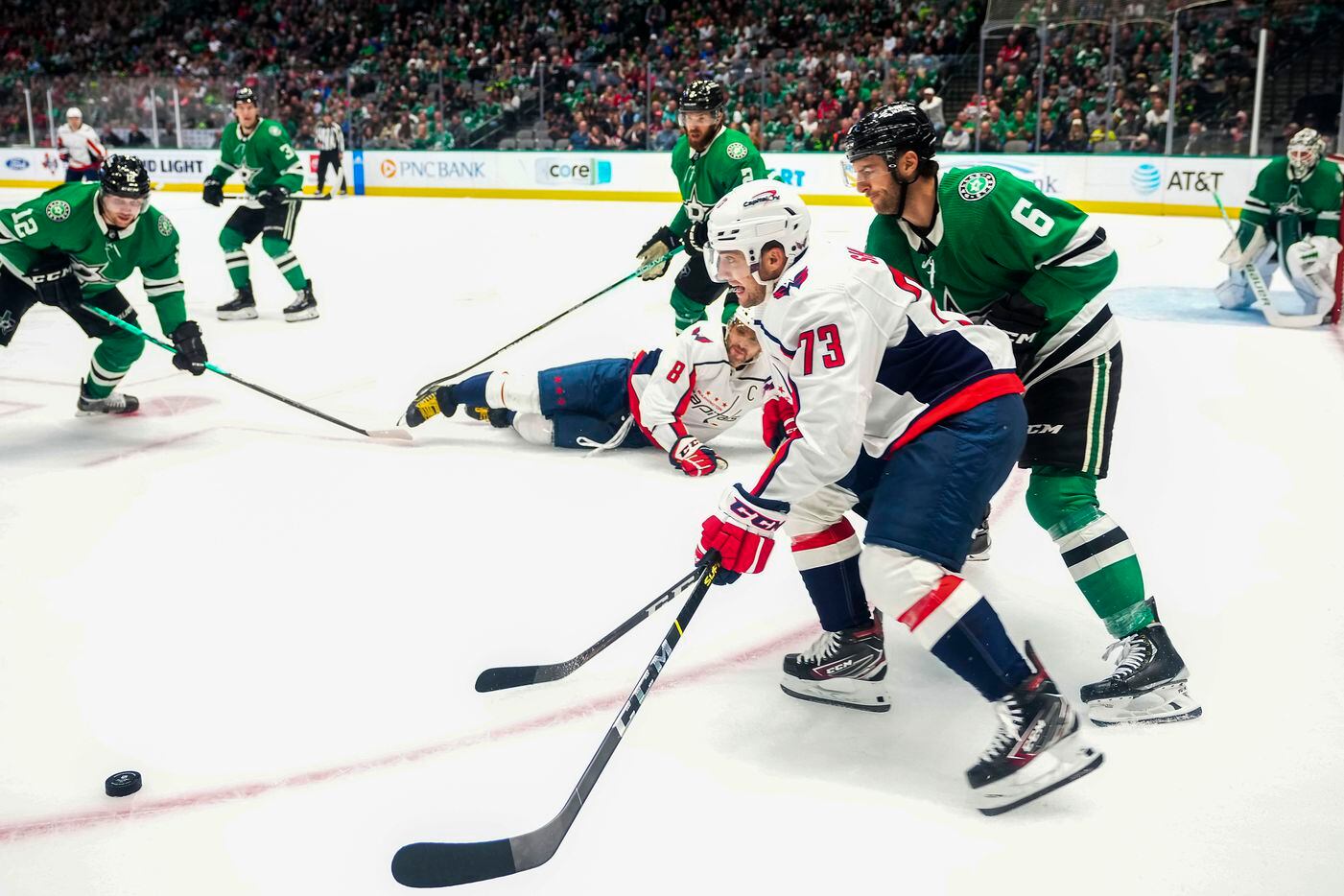 Washington Capitals left wing Conor Sheary (73) controls the puck against Dallas Stars...