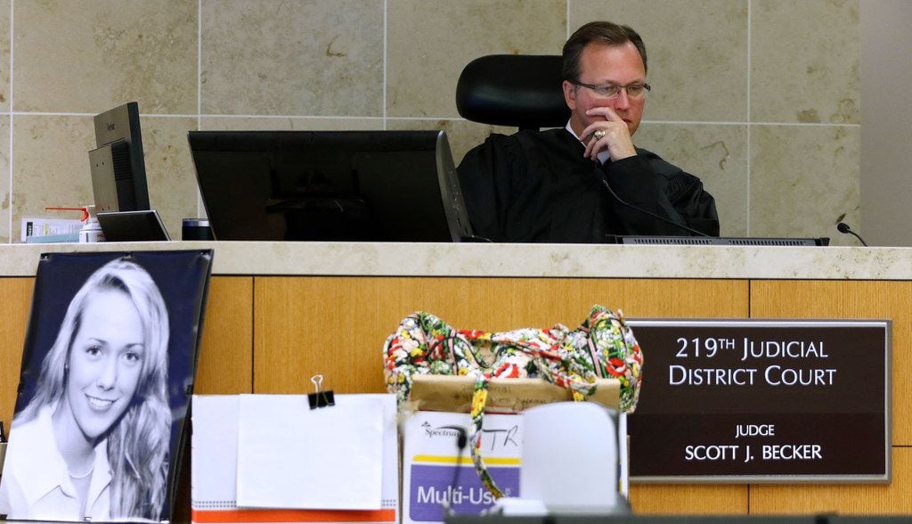 Judge Scott Becker (right) presides during the Jason Lowe murder trial at the Collin County...