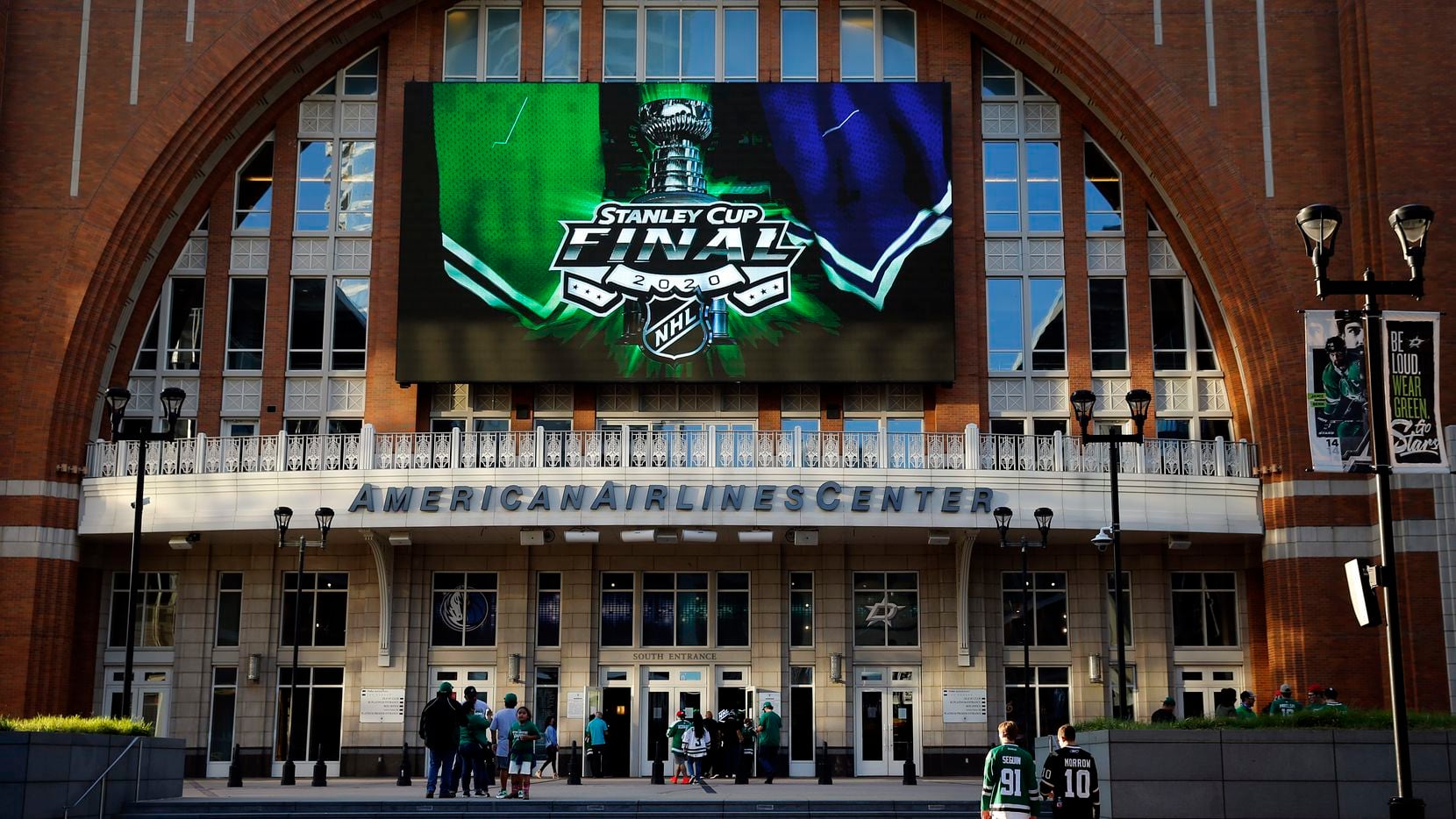 FILE - Stars fans arrive for a Stanley Cup Final watch party at American Airlines Center in...