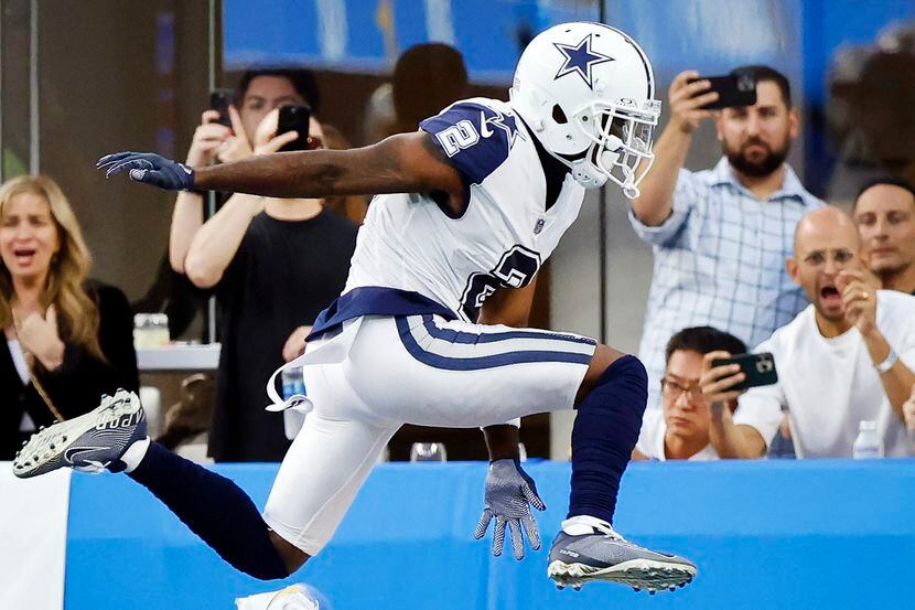 Dallas Cowboys cornerback Jourdan Lewis (2) hurdles Los Angeles Chargers wide receiver...