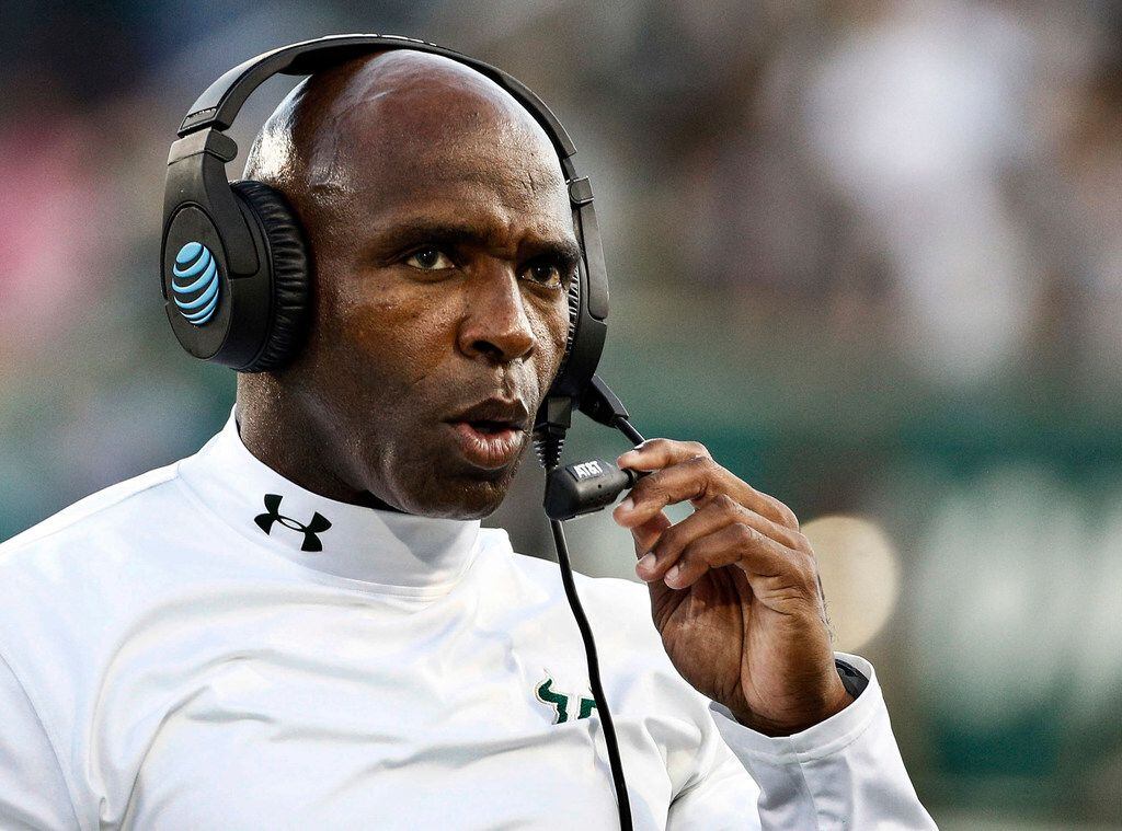 FILE - In this Oct. 21, 2017, file photo, South Florida head coach Charlie Strong looks on...