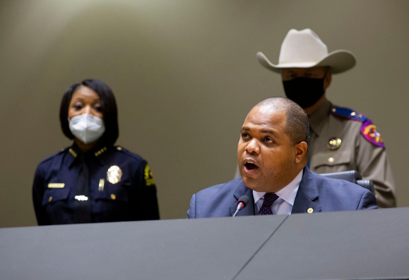 “The peaceful protesters, affected business owners and people of Dallas deserve clear and thorough answers regarding the ‘errors, miscalculations and shortcomings’ in the report” released by Dallas Police Chief U. Renee Hall (left) and the Police Department on Friday, Dallas Mayor Eric Johnson (seated) said Saturday.