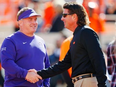 STILLWATER, OK - NOVEMBER 2:  Head coach Gary Patterson of the TCU Horned Frogs greets head coach Mike Gundy of the Oklahoma State Cowboys before their game on November 2, 2019 at Boone Pickens Stadium in Stillwater, Oklahoma.