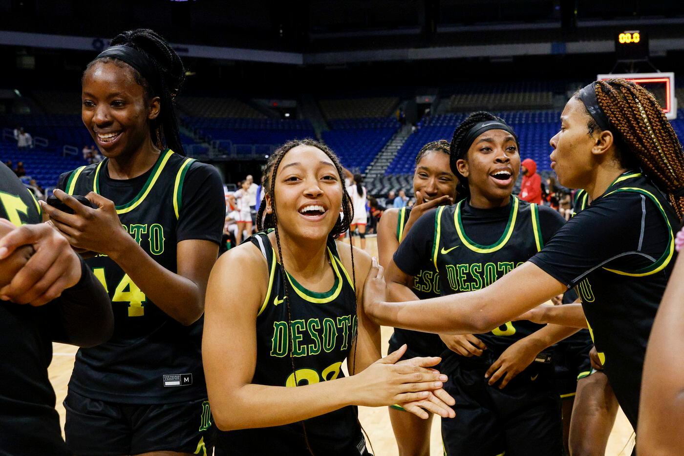 The DeSoto team celebrates after winning the Class 6A state championship at the Alamodome on...
