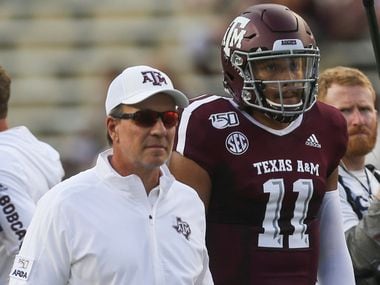 Texas A&M Aggies head coach Jimbo Fisher and quarterback Kellen Mond (11) participate in warm ups prior to a college football game between Texas A&M and Texas State on Thursday, Aug. 29, 2019 at Kyle Field in College Station, Texas. (Ryan Michalesko/The Dallas Morning News)