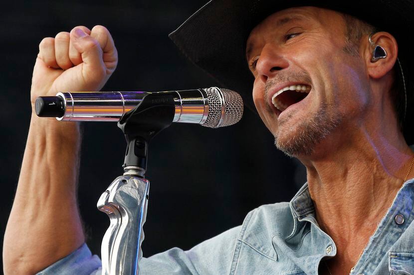 Tim McGraw sings during his performance at the March Madness Music Festival at Reunion Park...