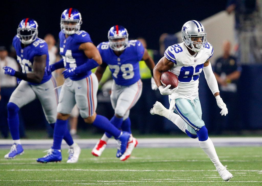 Dallas Cowboys wide receiver Terrance Williams (83) breaks away for a big catch and run...
