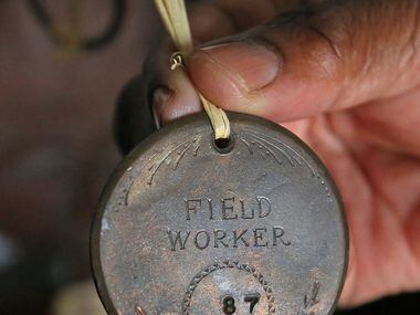 Wanell House shows a medallion worn by a slave, part of her collection of African-American...
