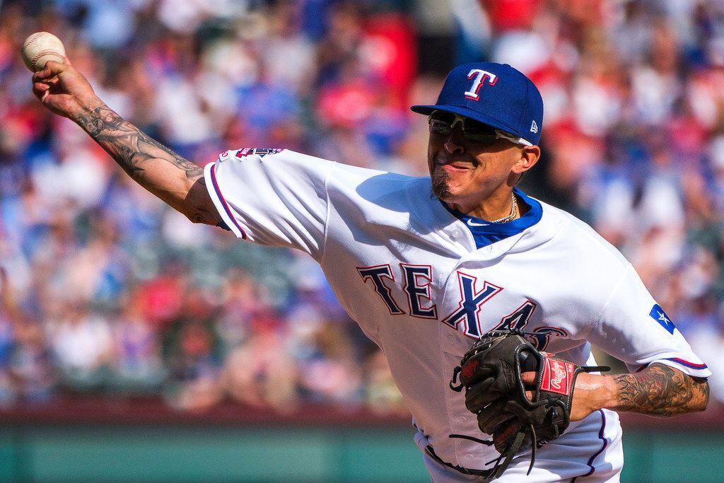 Texas Rangers relief pitcher Jesse Chavez throws during the sixth inning against the Chicago...