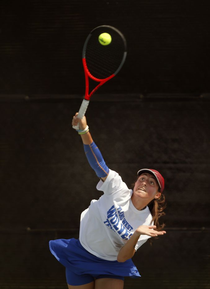 In a 6A girls singles match, Plano West's Natasha Opaciuch serves. UIL state tennis semifinals at Northside ISD Tennis Center on Thursday, May 20, 2021.