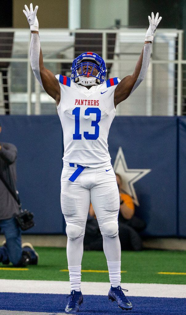 Duncanville wide receiver Roderick Daniels celebrates after making a running the ball into...