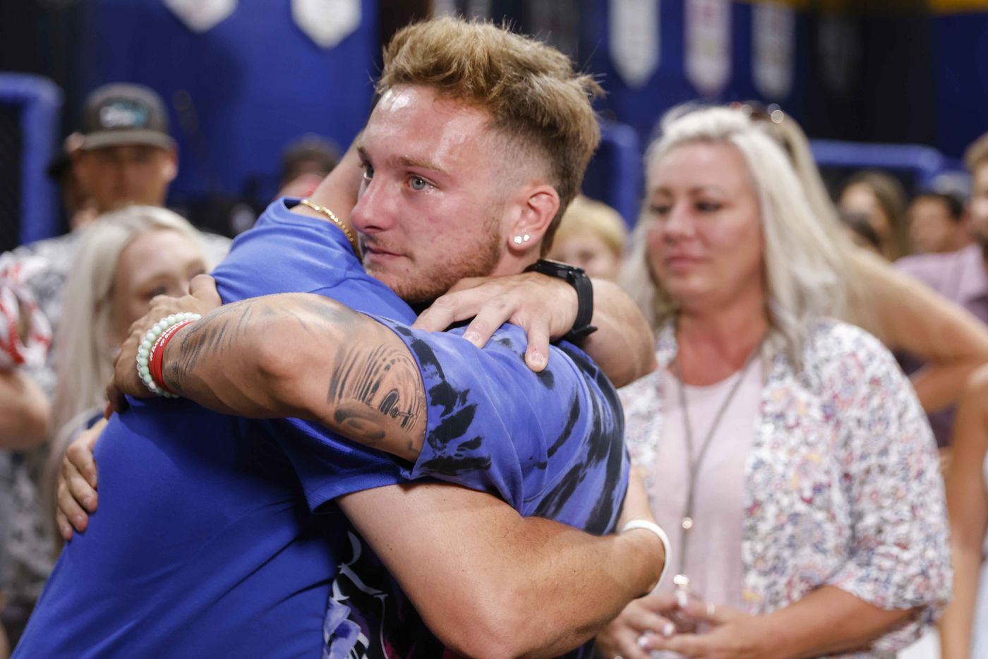 Rockwall-Heath baseball player Jett Williams gets emotional as he hugs his hitting coach...