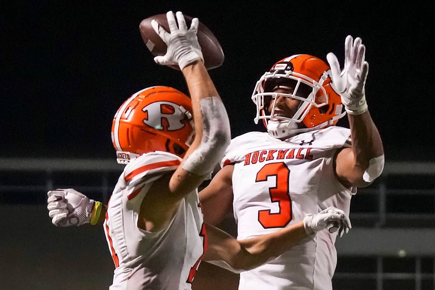 Rockwall wide receiver Caden Marshall (11) celebrates with wide receiver Noble Johnson (3)...