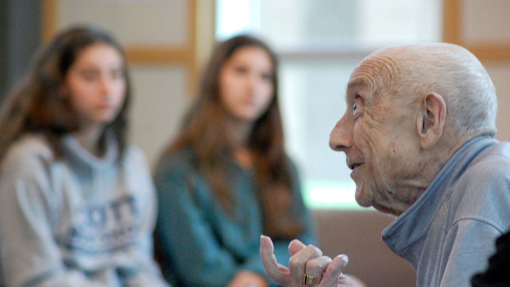 Max Glauben speaks with high school seniors at Akiba Yavneh Academy April 12.  Photo...