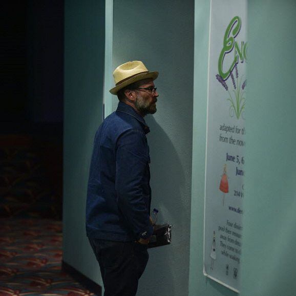 Actor writer, producer and director Jason Lee stands in the side aisle before sitting down...
