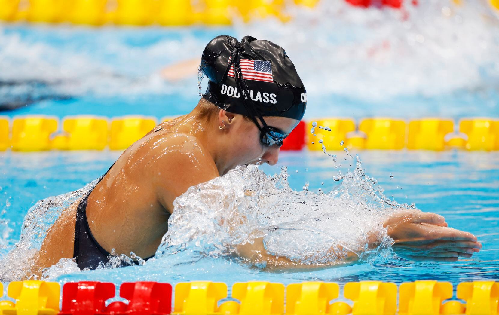 Team USA swimmer Kate Douglass sped through her lane in the women’s 200 meter individual...