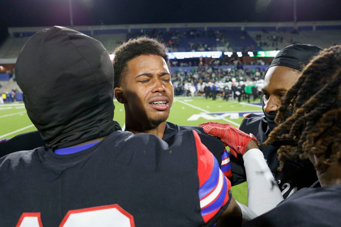 Duncanville quarterback Solomon Jones (3) is overcome with emotion after defeating Southlake Carroll in their Class 6A Division I state semifinal playoff game at McKinney ISD Stadium in McKinney, Texas, Saturday, Dec. 11, 2021. Duncanville defeated Southlake Carroll 35-9. (Elias Valverde II/The Dallas Morning News)