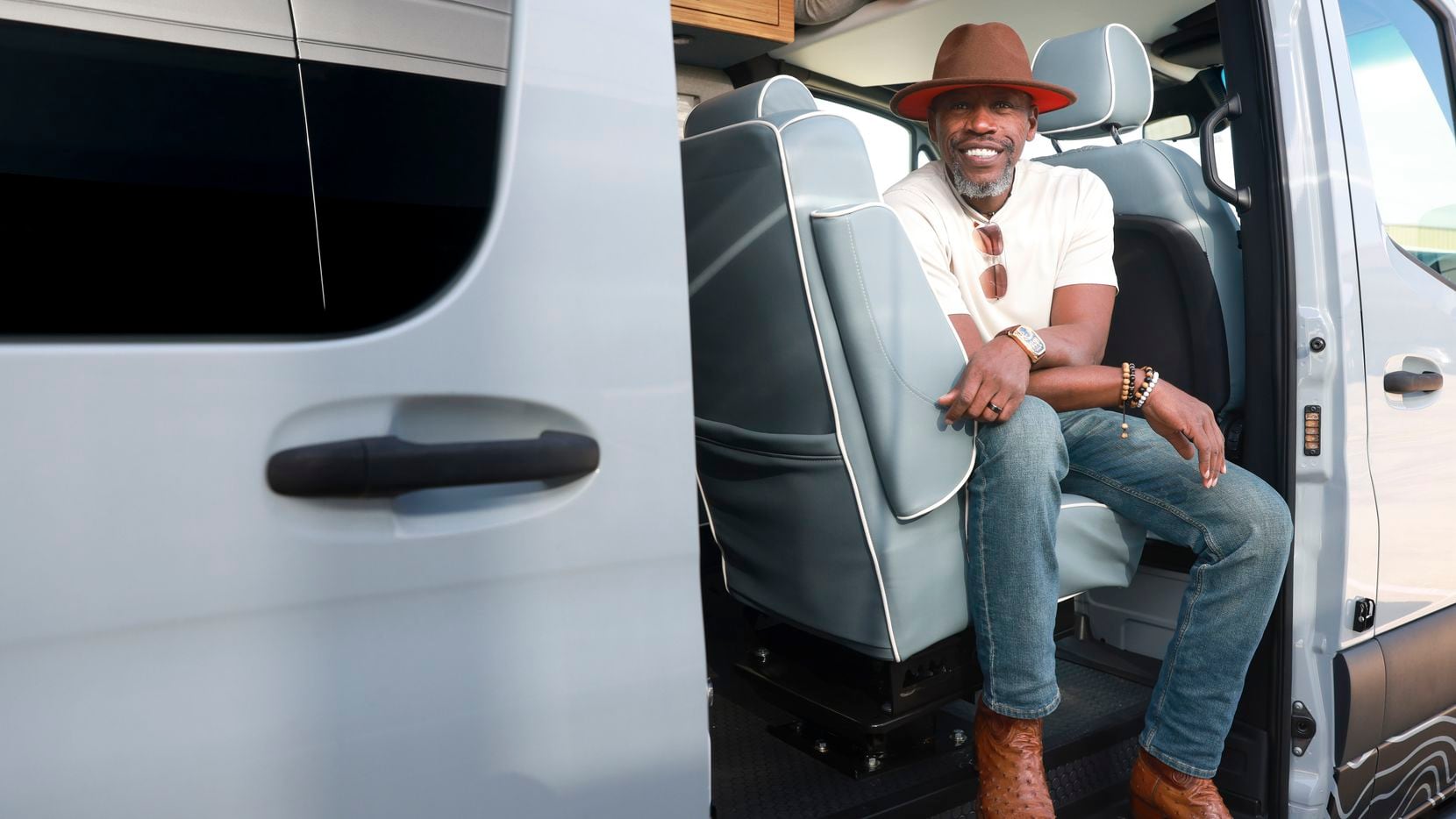 Co-owner Benny Black sits inside a converted Mercedes-Benz sprinter van at Iconic Sprinters...