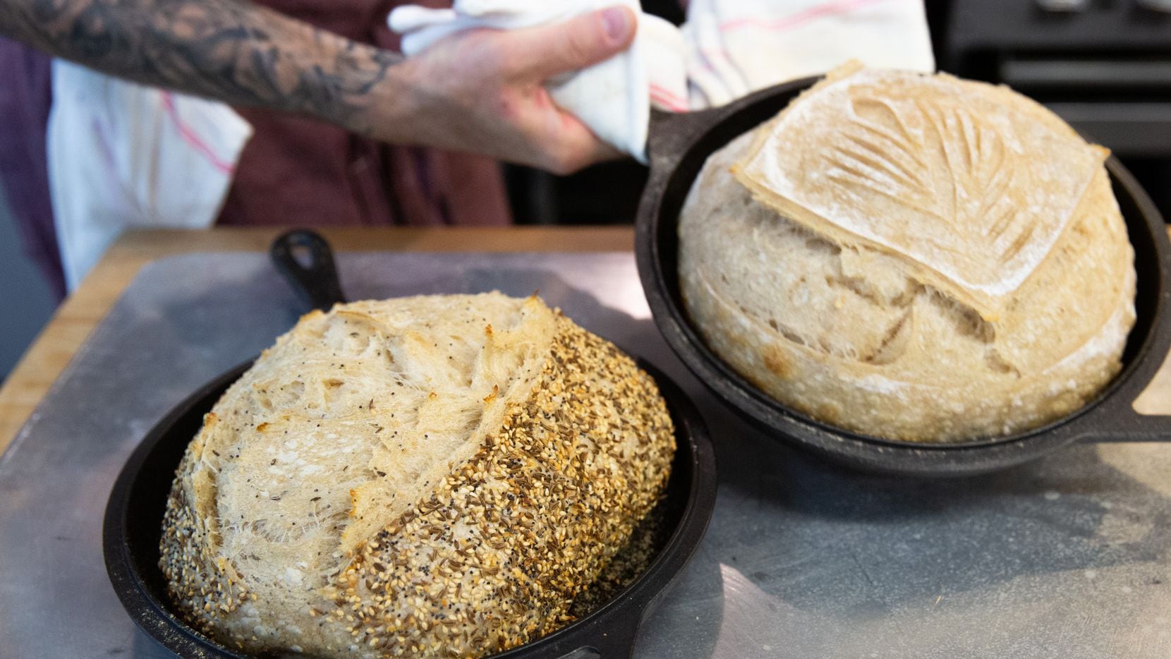 Matt Bresnan, head chef at Food Company, removes two loaves of bread in the Nonna kitchen in Highland Park in Dallas on Monday, July 1, 2019. Bresnan is breaking out with his own business called Bresnan Bread and Pastry and will eventually be opening his own bakery. (Lynda M. Gonzalez/The Dallas Morning News)