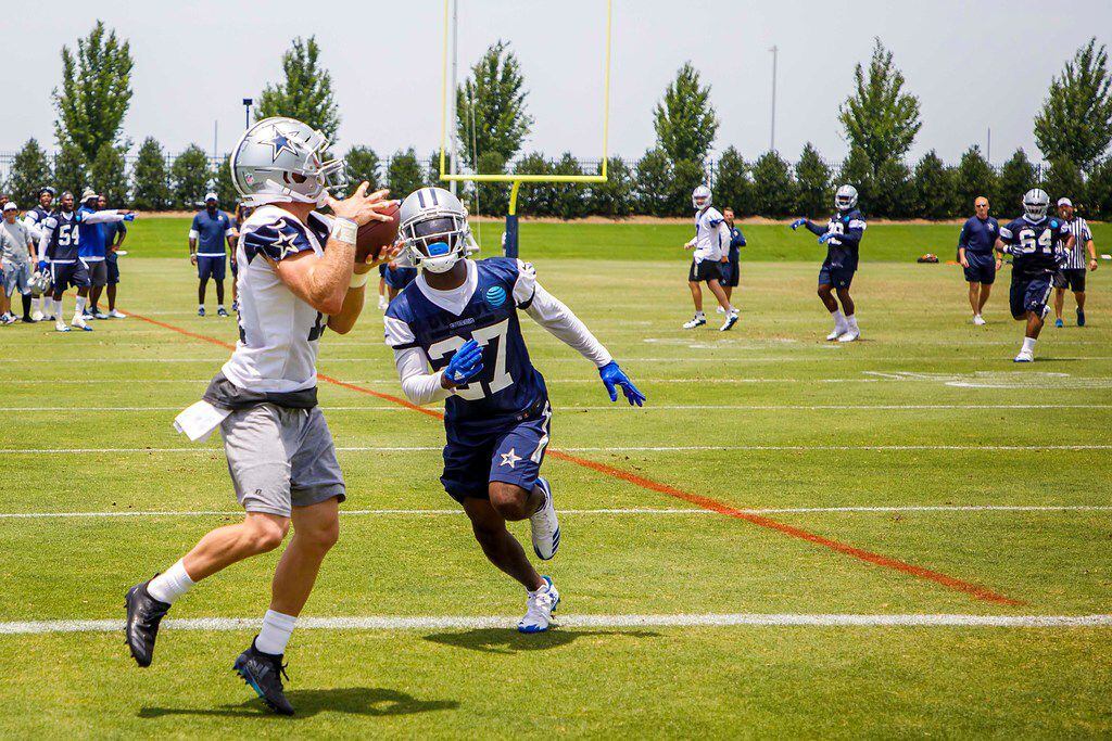 Dallas Cowboys wide receiver Cole Beasley (11) catches a touchdown  pass behind cornerback...