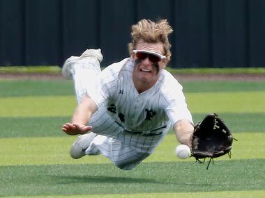 Prosper left fielder Jacob Devenny (24) was unable to make the diving catch in the fourth...