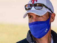 Texas Rangers executive vice president & general manager Chris Young watches during a spring...