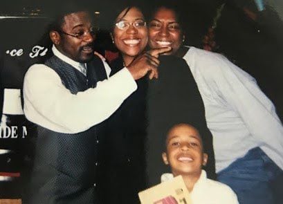 Marcus Bell Jr. (front) and his mother, Donna Fields (center), in a photo from about 2003 with Pastor Rickie Rush and a friend. Fields says Rush tried to position himself as a father figure to her and her sister before he sexually abused them.