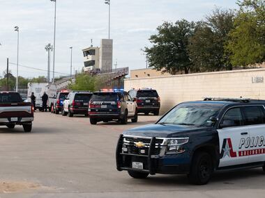 Arlington Police Officers outside of Lamar High School after a school shooting left two...