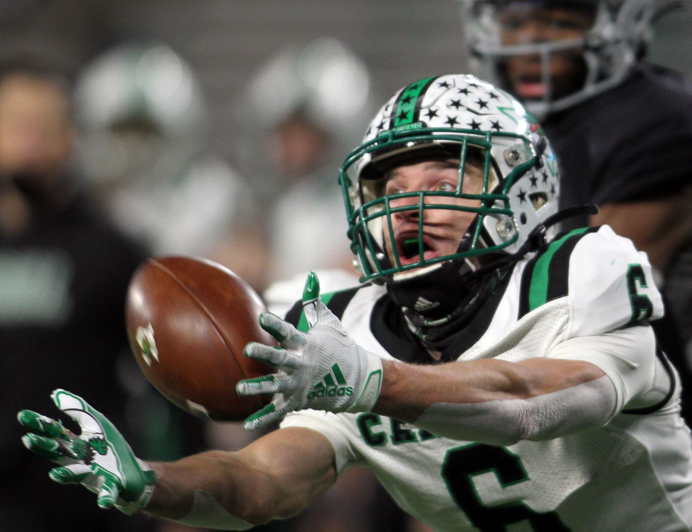 Southlake receiver Landon Samson (6) lunges for a pass but is unable to secure the catch...