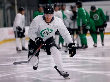 P.J. Fletcher (67) participates in a drill during the Stars’ annual development camp Group A...