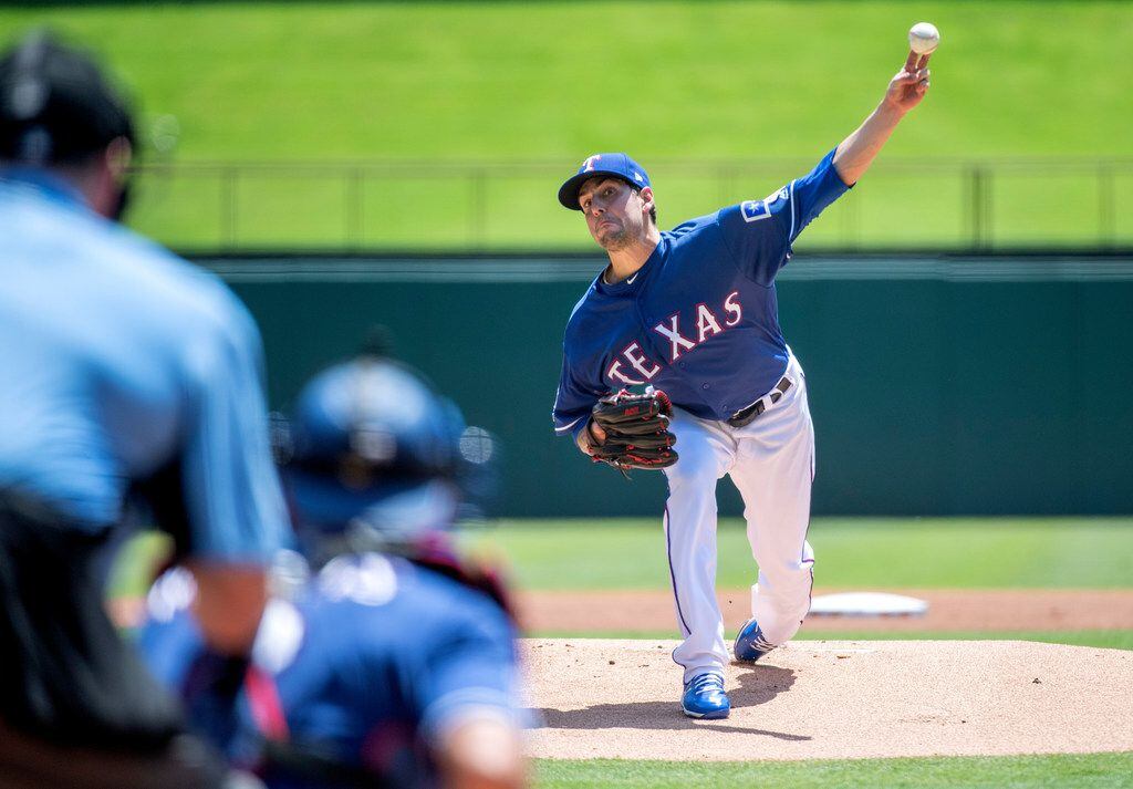 Texas Rangers starting pitcher Joe Palumbo works against the Los Angeles Angels during the...
