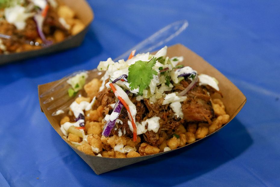 Crispy crazy corn, created by 87-year-old Ruth Hauntz (in conjunction with Brent and Juan Reaves, owners of Smokey John's Bar-B-Que) layers fried corn with silky pulled pork, cold and crunchy coleslaw and a zingy dressing.