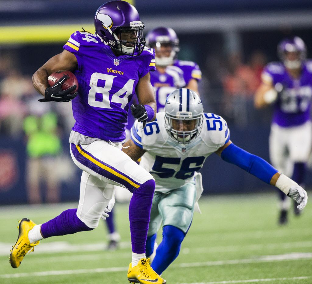 Dallas Cowboys linebacker Keith Smith (56) attempts to tackle Minnesota Vikings wide...