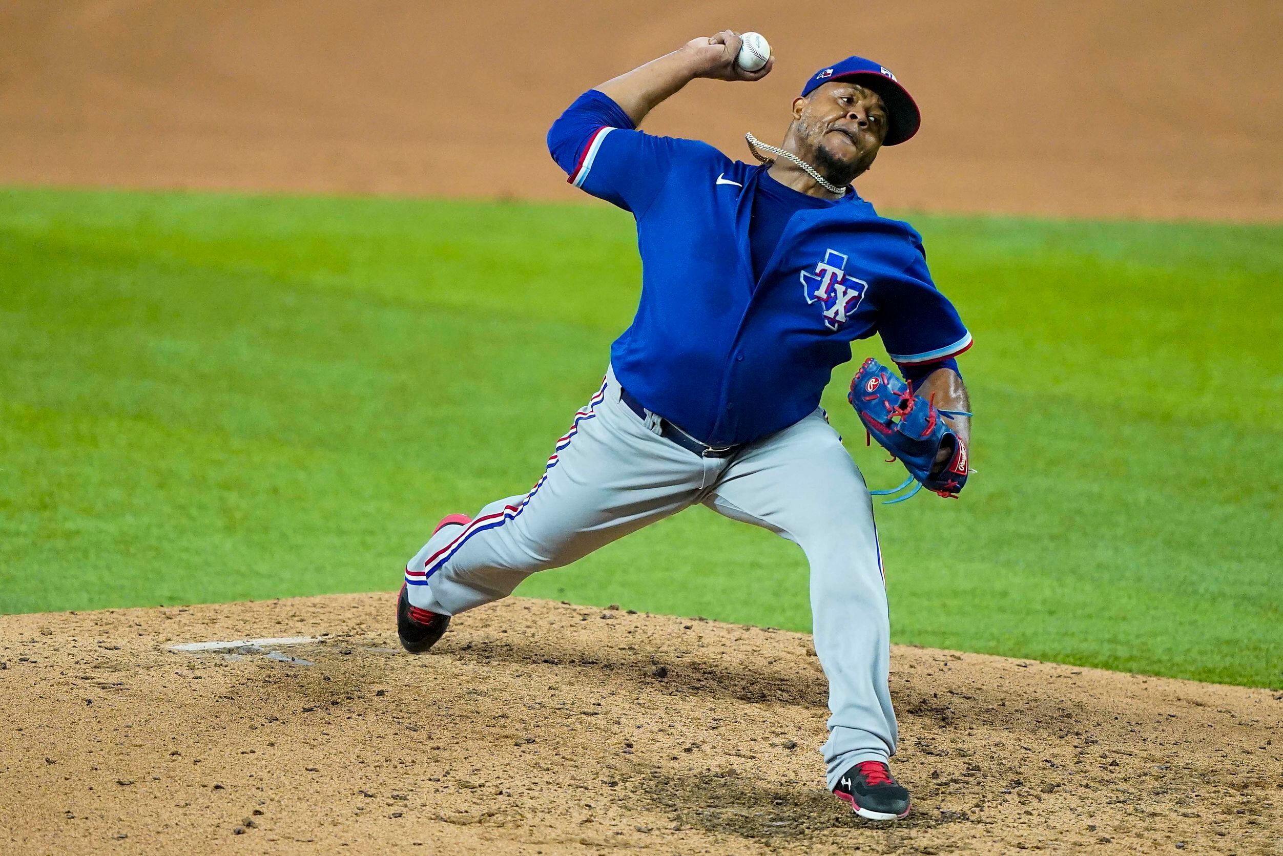 Edinson Volquez pitches during Texas Rangers Summer Camp at Globe Life Field on Thursday,...