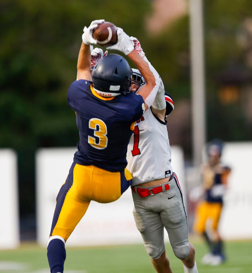 Highland Park wide receiver Jackson Heis (3) catches a pass over Flower Mound Marcus...