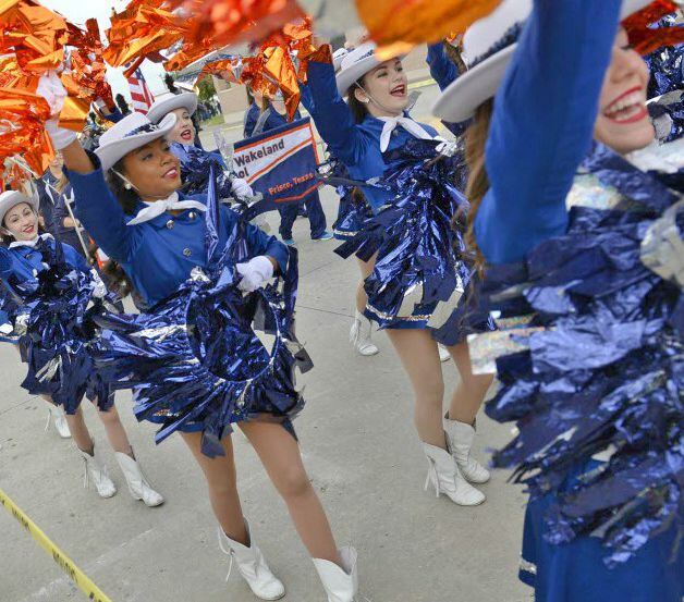 The Wakeland High School drill team marches in the Frisco Community Parade.