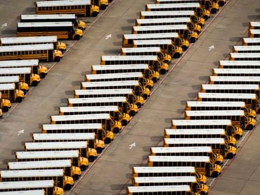 Aerial view of idle school buses at the Dallas ISD Student Transportation Services North Dallas Lot in April 2020.