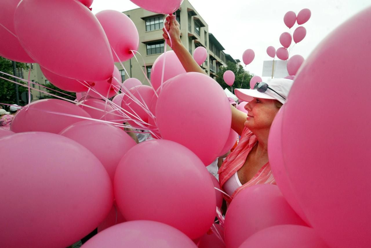 
Jan Simpson gave out balloons to survivors at the 2005 Susan G. Komen Breast Cancer...