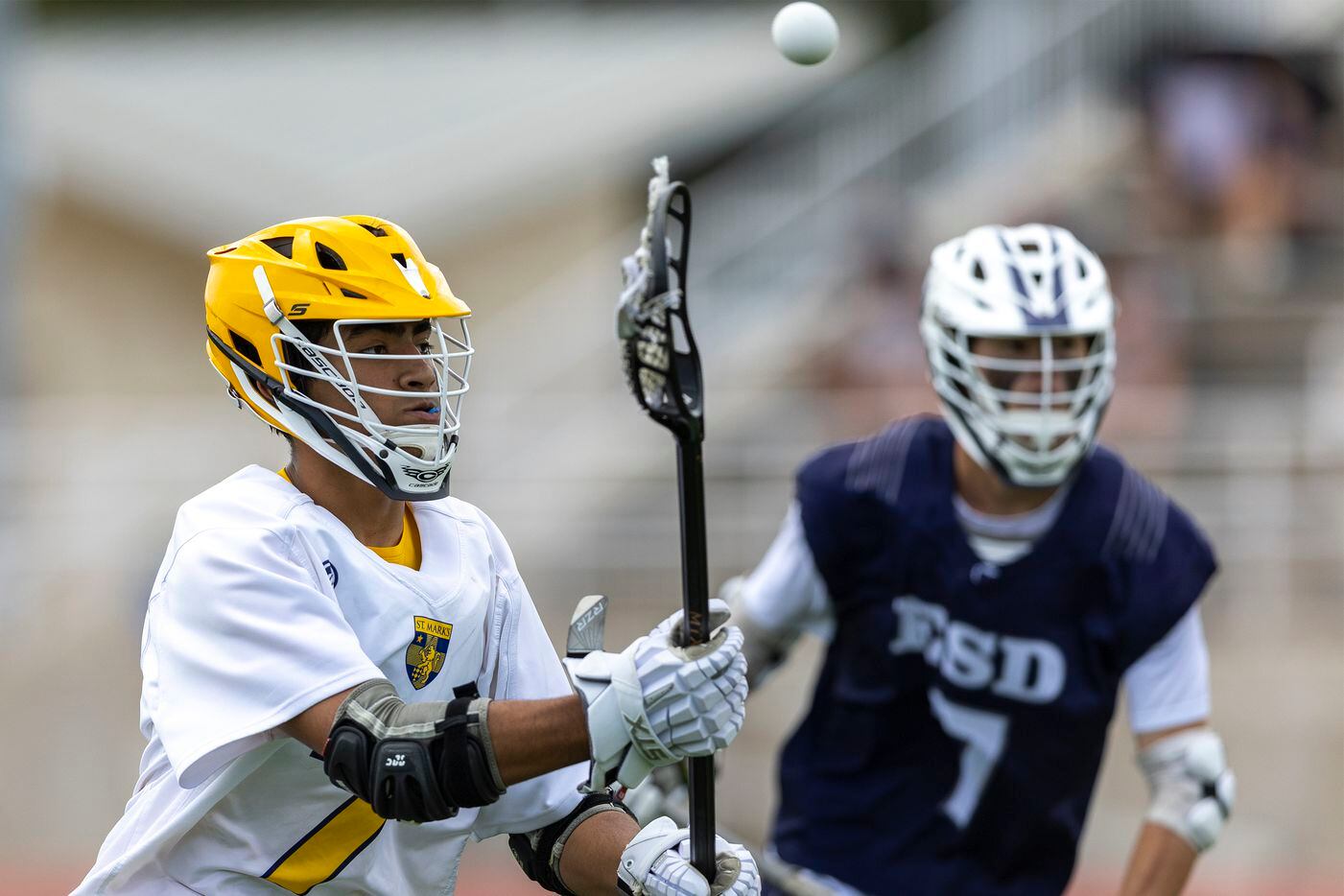 St. Mark's Murphy Paul passes around the goal against Episcopal School of Dallas during the...